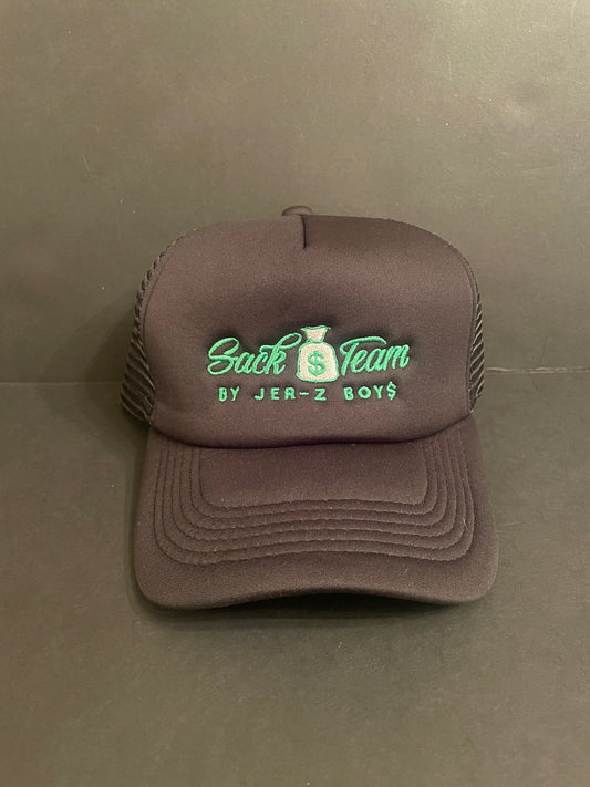 Black trucker hat with Kelly green embroidered logo