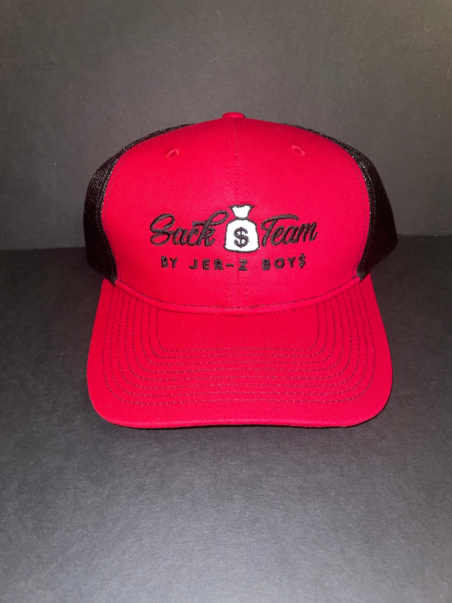 Red/black trucker with black embroidered logo